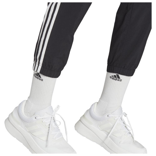 Adidas Γυναικείο παντελόνι φόρμας Essentials W 3-Stripes Woven 7/8  Pants